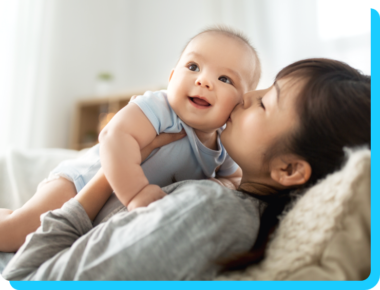 Image of mother kissing her baby Image of mother kissing her baby